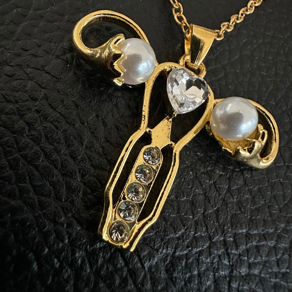 Woman’s Uterus Gold tone Necklace